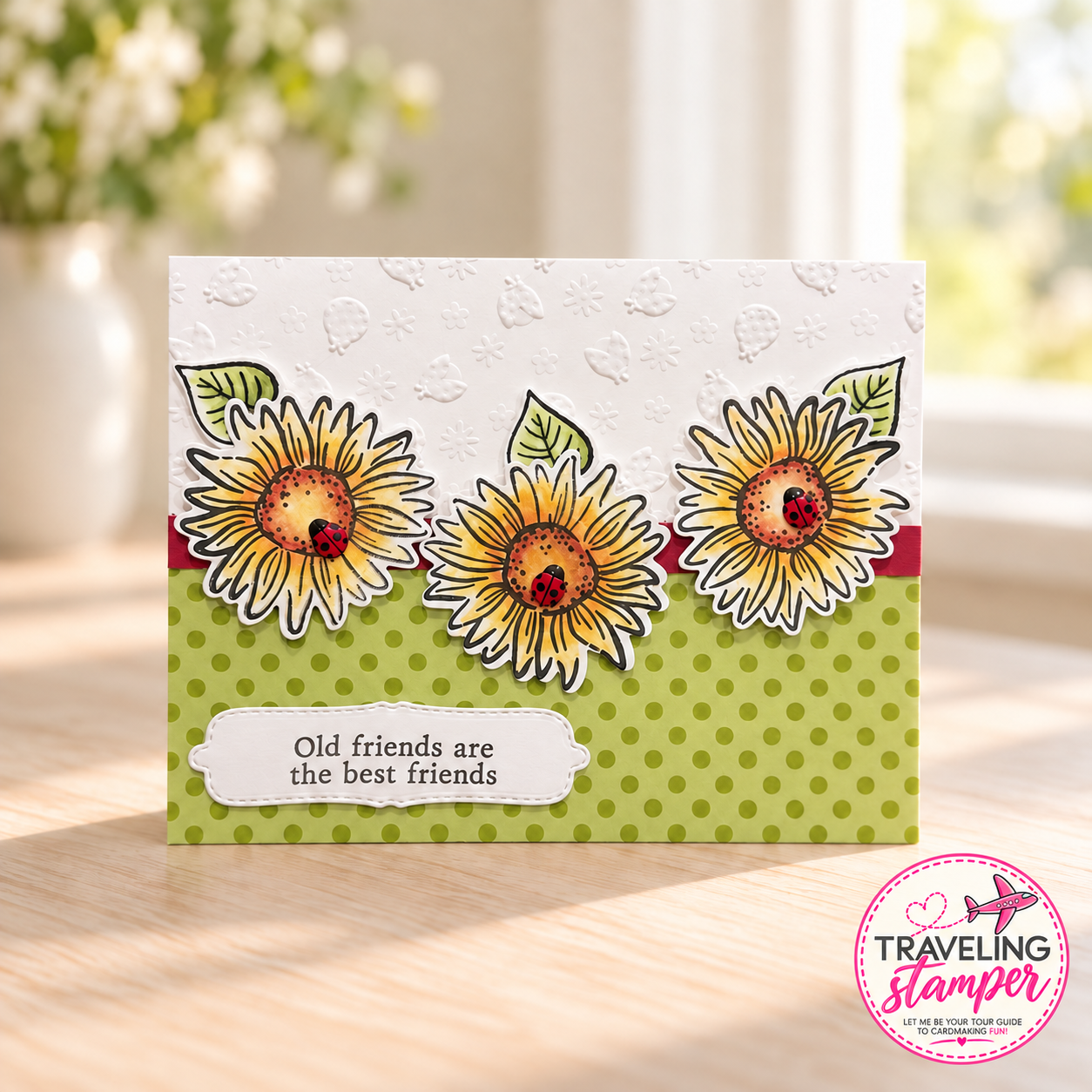 Handmade sunflower friendship card with yellow flowers, ladybug accents, an embossed white panel, green patterned paper, and an “Old friends are the best friends” greeting.